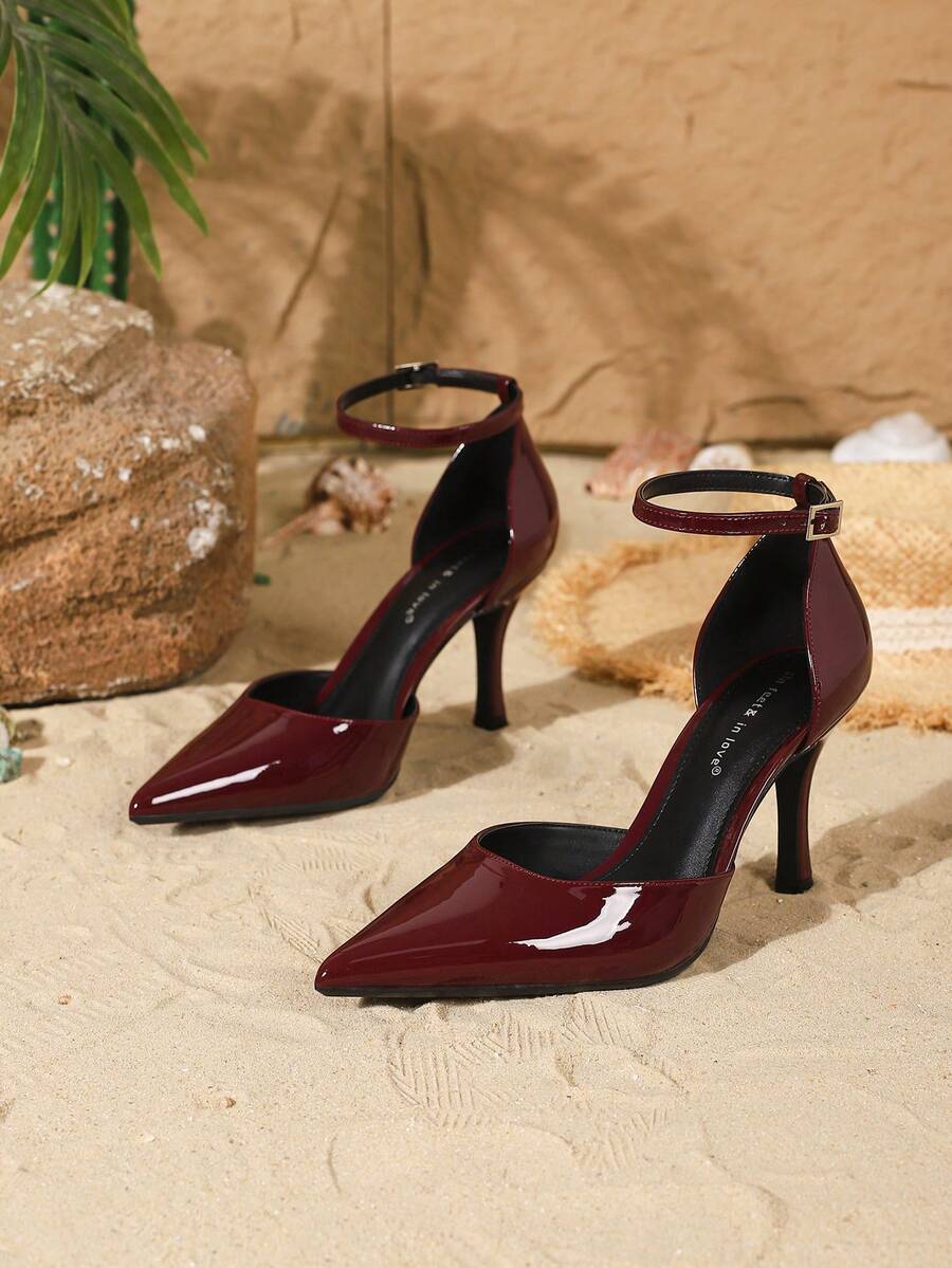 Elegant pointy-toe stiletto high heel pumps with hollow out sides and buckle ankle strap for weddings and evening dresses.
