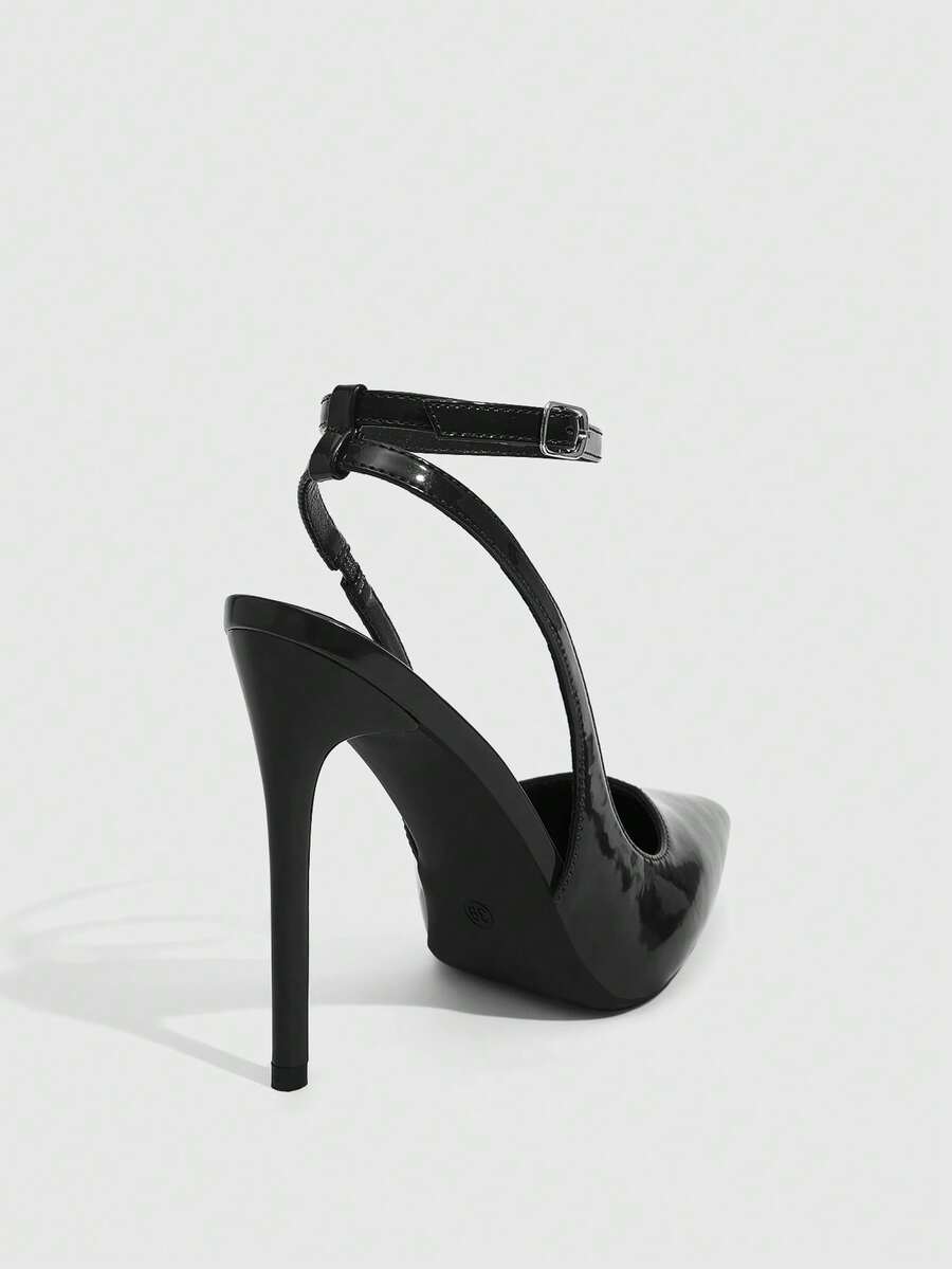 Pointed toe stiletto high heels with slingback silhouette and adjustable buckle ankle strap.