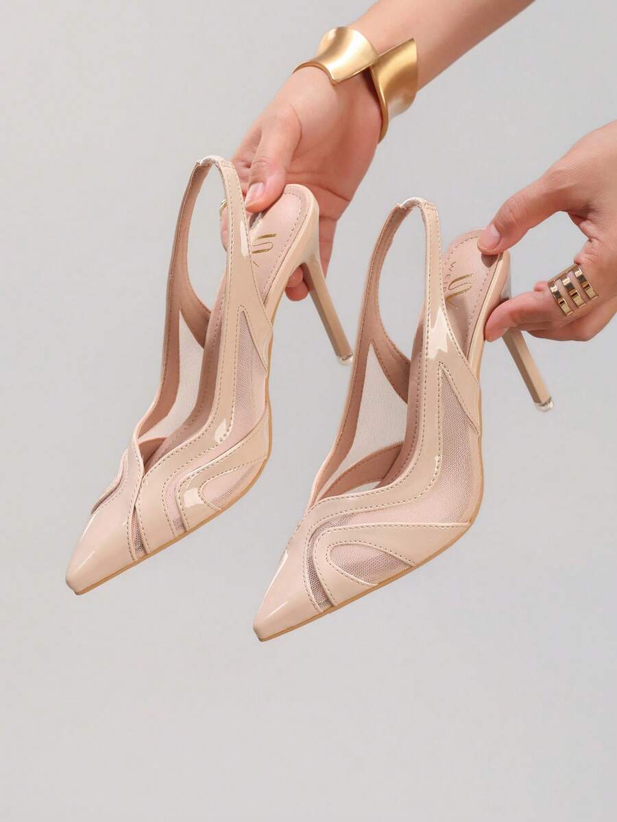 Black lace pointed toe high heel pumps featuring stiletto heels and a decorative bow accent.