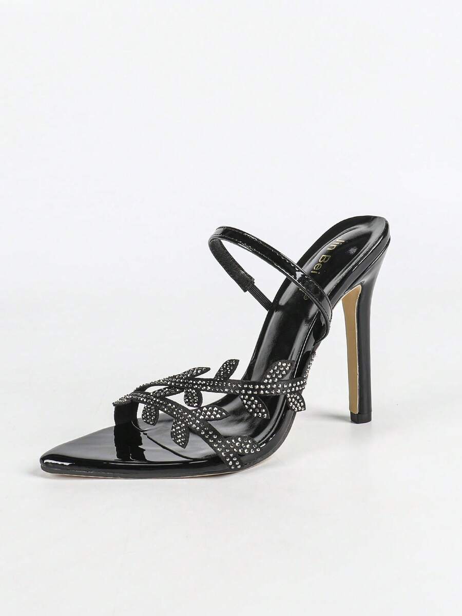 Women's stiletto high heel sandals with sparkling vine-shaped rhinestone ankle strap embellishments and open pointed toe design.