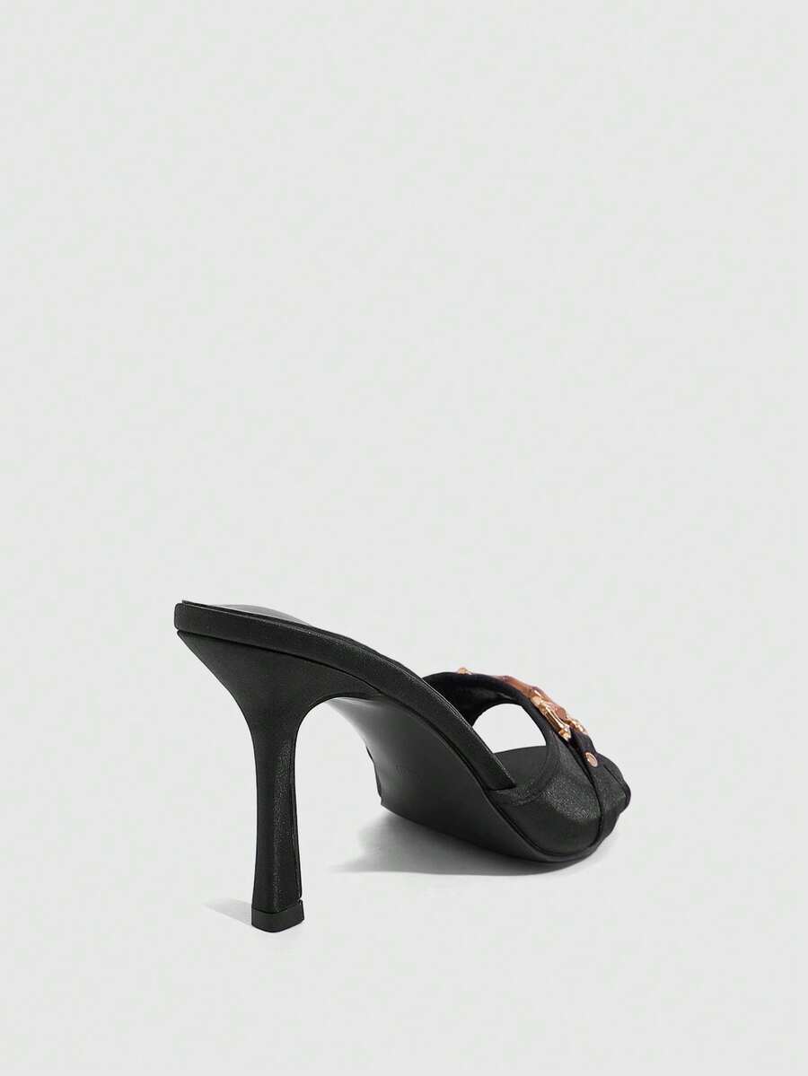 Women's beige high heel mule sandals with open round toe and metal chain detail
