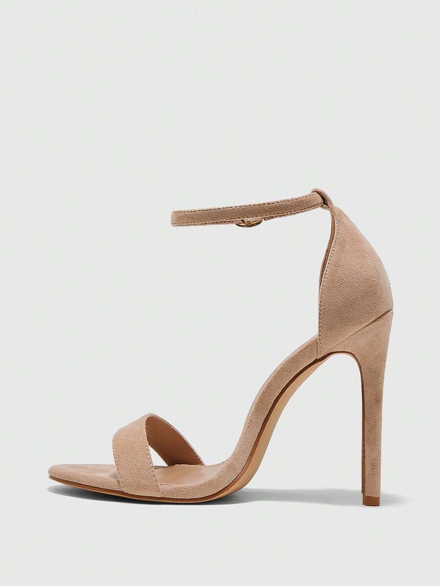 Women's stiletto sandals featuring an ankle strap buckle closure and classic round open toe design.