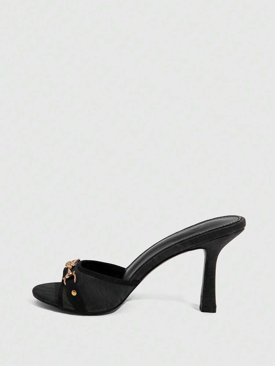 Women's beige high heel mule sandals with open round toe and metal chain detail
