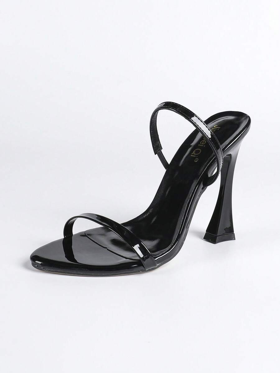 Women's stiletto high heel sandals with round open toe and back ankle strap in solid finish.