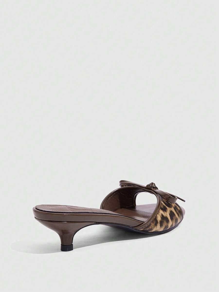 Burgundy high heel sandals for women featuring an open toe, decorative bow, 5.5cm kitten heel, and slingback strap.