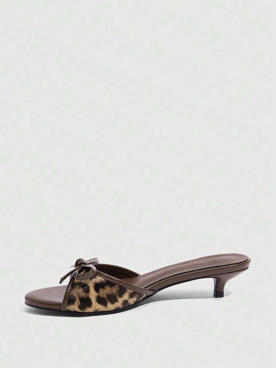 Burgundy high heel sandals for women featuring an open toe, decorative bow, 5.5cm kitten heel, and slingback strap.
