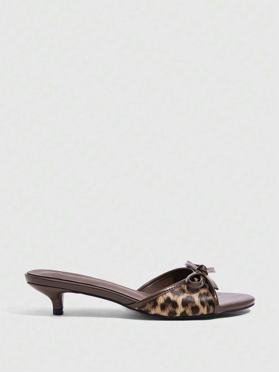Burgundy high heel sandals for women featuring an open toe, decorative bow, 5.5cm kitten heel, and slingback strap.