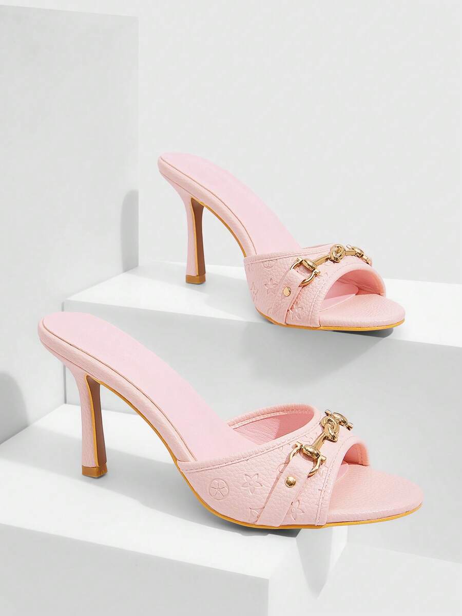 Women's open toe high heel slingback sandals featuring metal bamboo joint accent and stiletto heels.