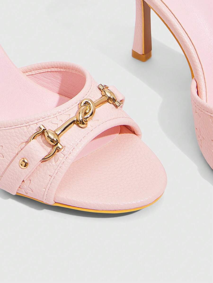 Women's open toe high heel slingback sandals featuring metal bamboo joint accent and stiletto heels.