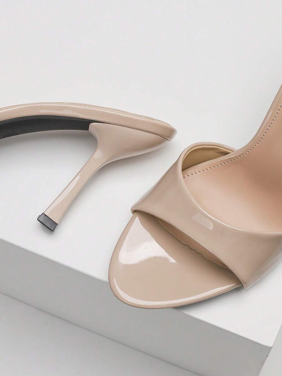 Women's open toe high heel sandals with slingback strap and sleek stiletto heel in smooth PU leather.