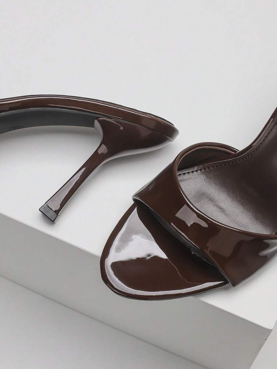 Women's open toe high heel sandals with slingback strap and sleek stiletto heel in smooth PU leather.