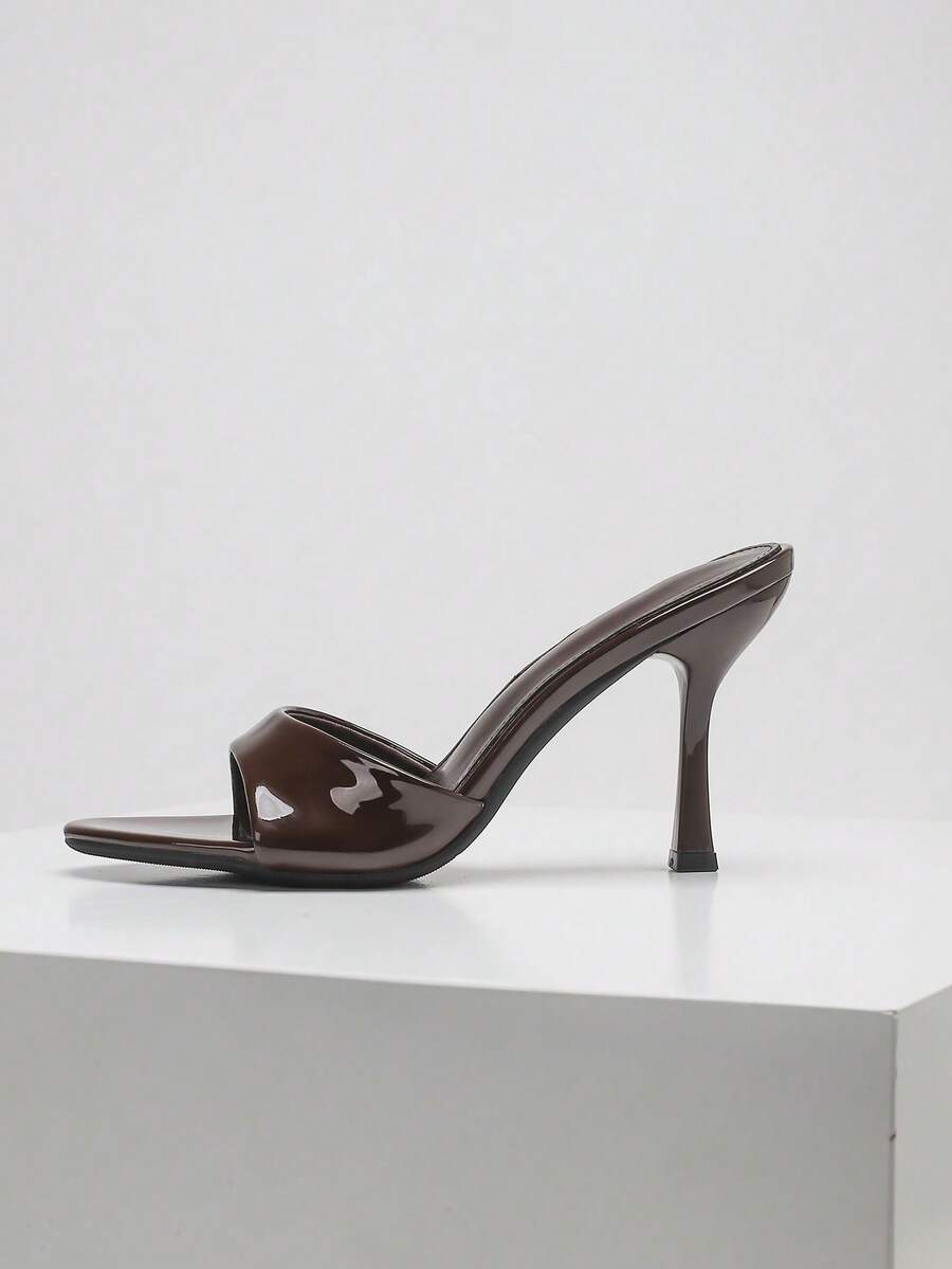 Women's open toe high heel sandals with slingback strap and sleek stiletto heel in smooth PU leather.