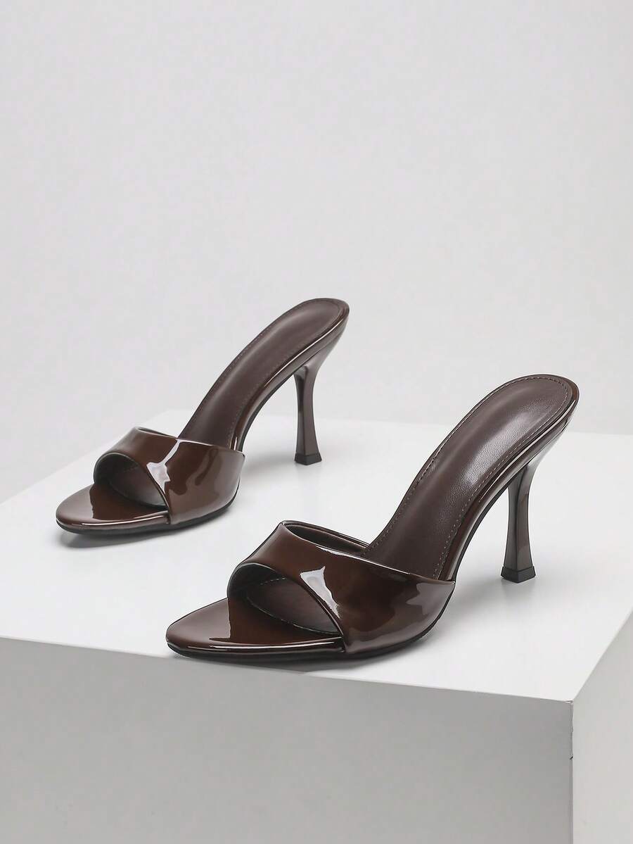 Women's open toe high heel sandals with slingback strap and sleek stiletto heel in smooth PU leather.