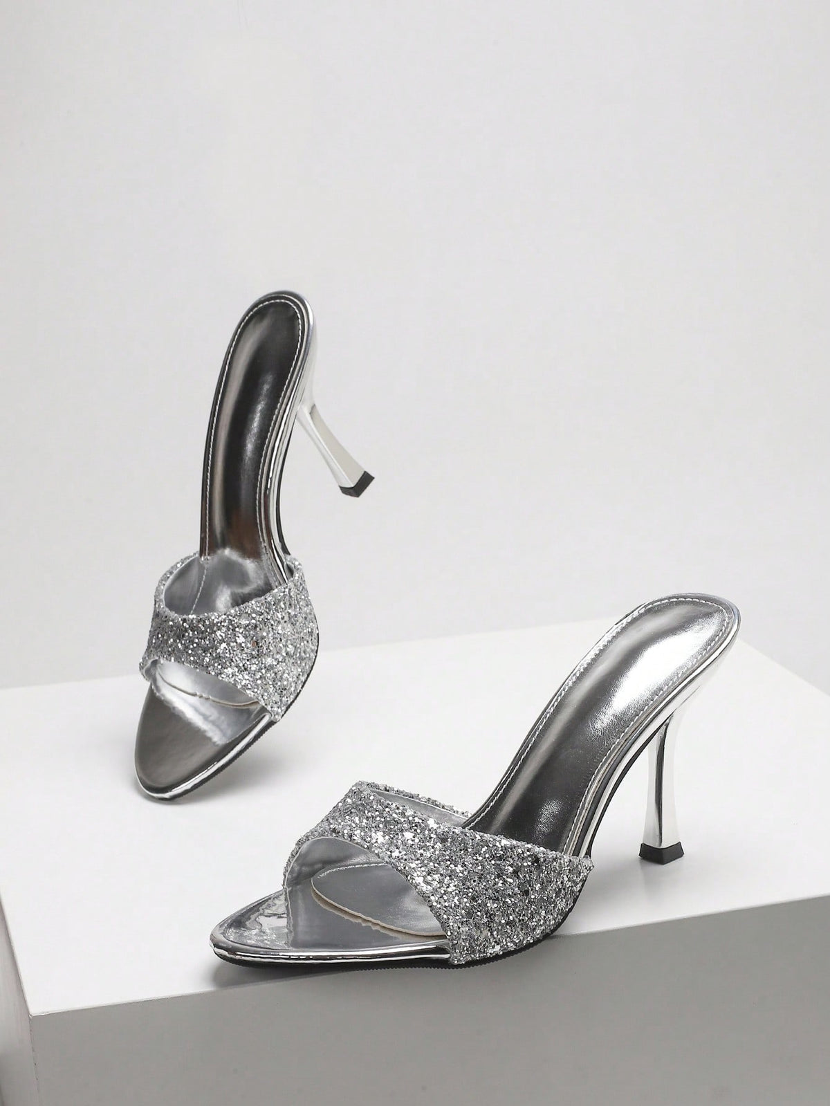 Women's open toe high heel sandals with slingback strap and sleek stiletto heel in smooth PU leather.