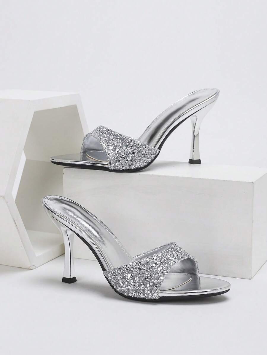 Women's open toe high heel sandals with slingback strap and sleek stiletto heel in smooth PU leather.