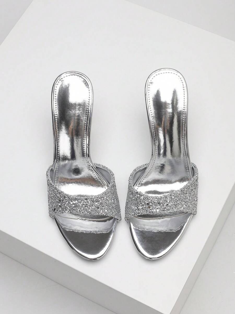 Women's open toe high heel sandals with slingback strap and sleek stiletto heel in smooth PU leather.