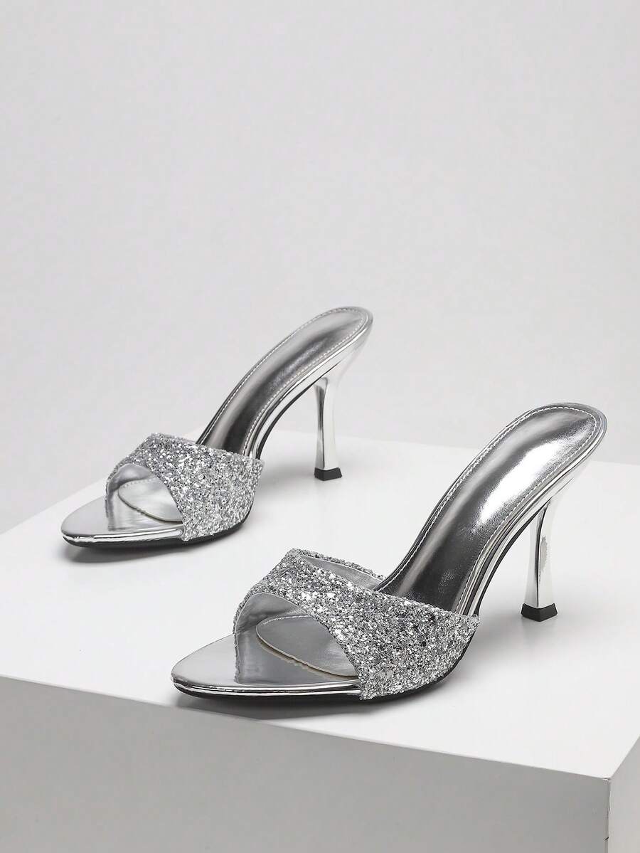 Women's open toe high heel sandals with slingback strap and sleek stiletto heel in smooth PU leather.