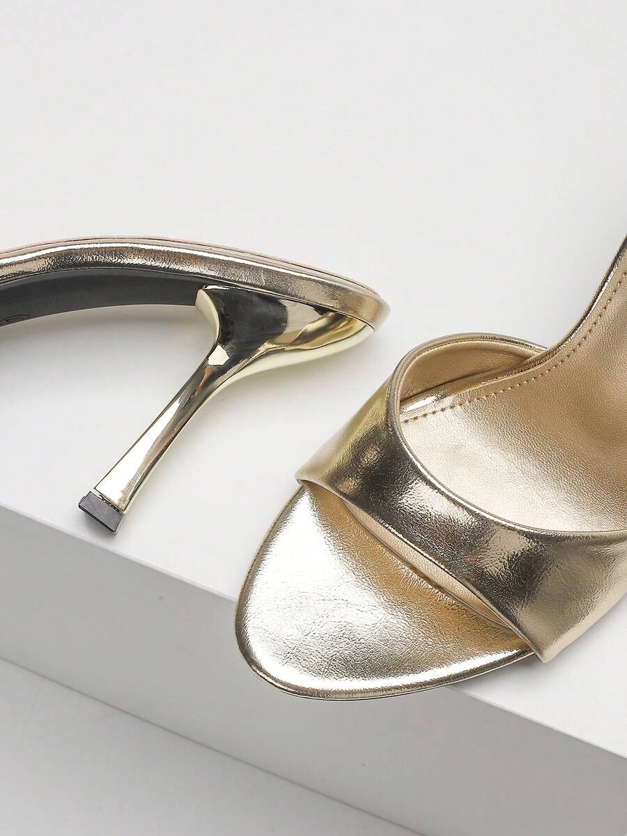 Women's open toe high heel sandals with slingback strap and sleek stiletto heel in smooth PU leather.