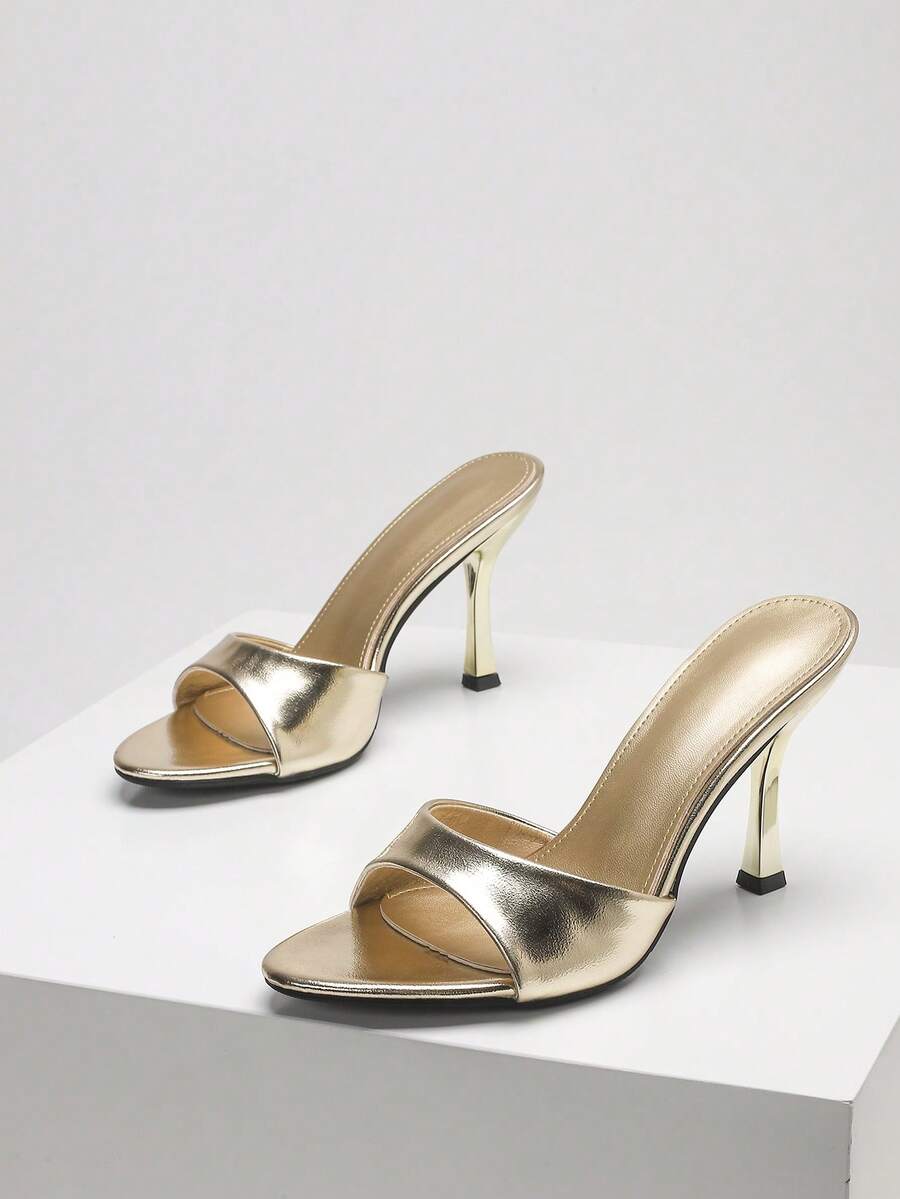 Women's open toe high heel sandals with slingback strap and sleek stiletto heel in smooth PU leather.
