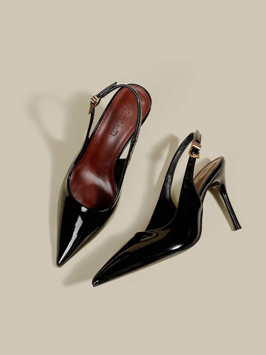 Women's pointed toe kitten heel pumps with adjustable buckle back strap and sleek patent finish.