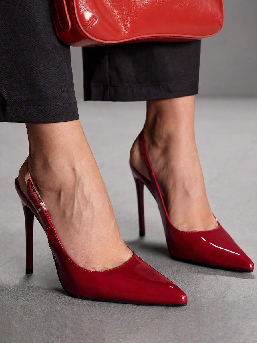 Pointed toe stiletto high heel evening party pumps featuring an ankle strap with buckle closure.
