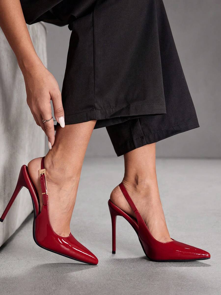 Pointed toe stiletto high heel evening party pumps featuring an ankle strap with buckle closure.
