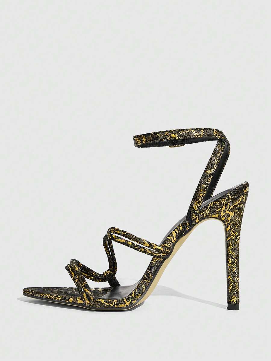Snake pattern open toe high heel sandals with thin stiletto heel and buckle ankle strap for women.
