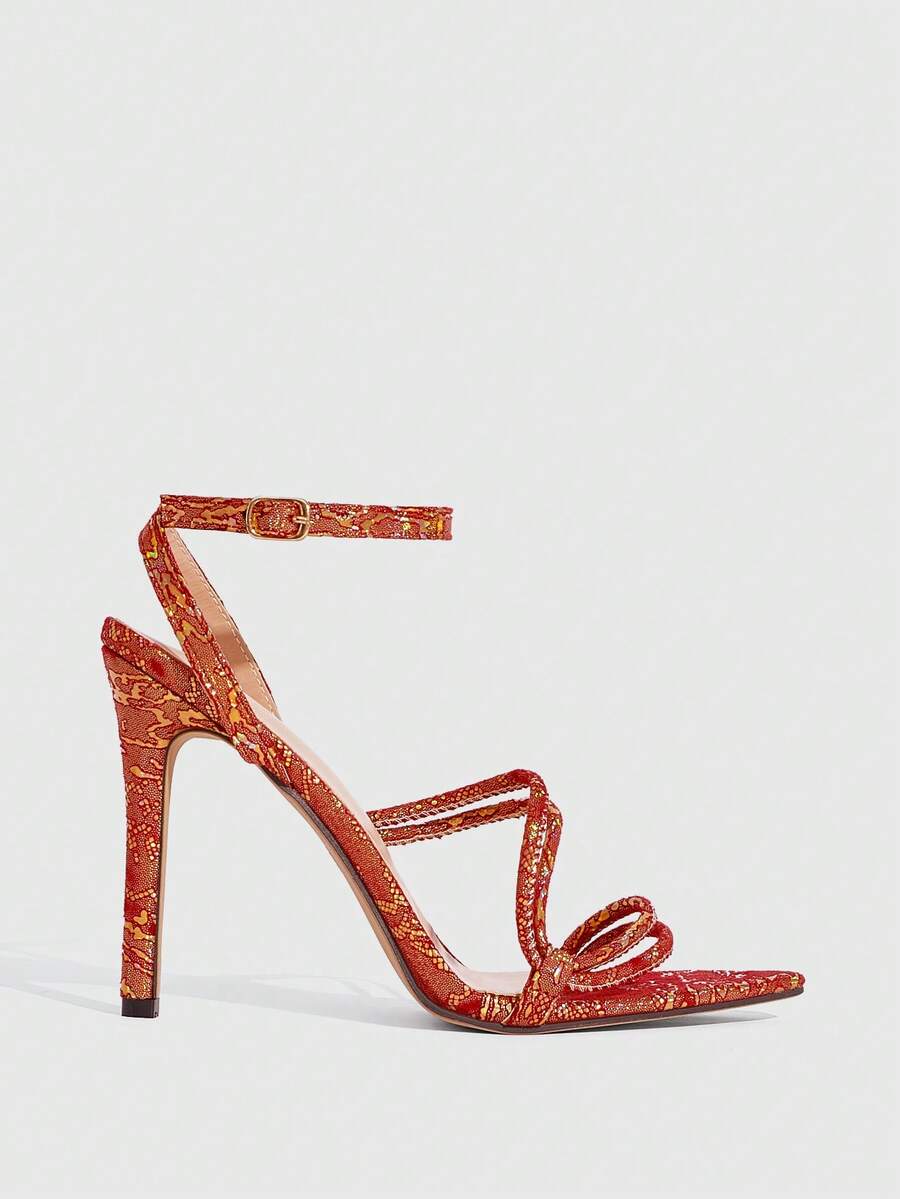 Snake pattern open toe high heel sandals with thin stiletto heel and buckle ankle strap for women.