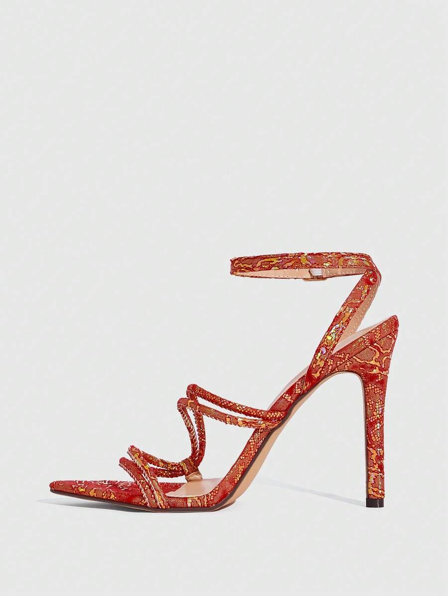 Snake pattern open toe high heel sandals with thin stiletto heel and buckle ankle strap for women.
