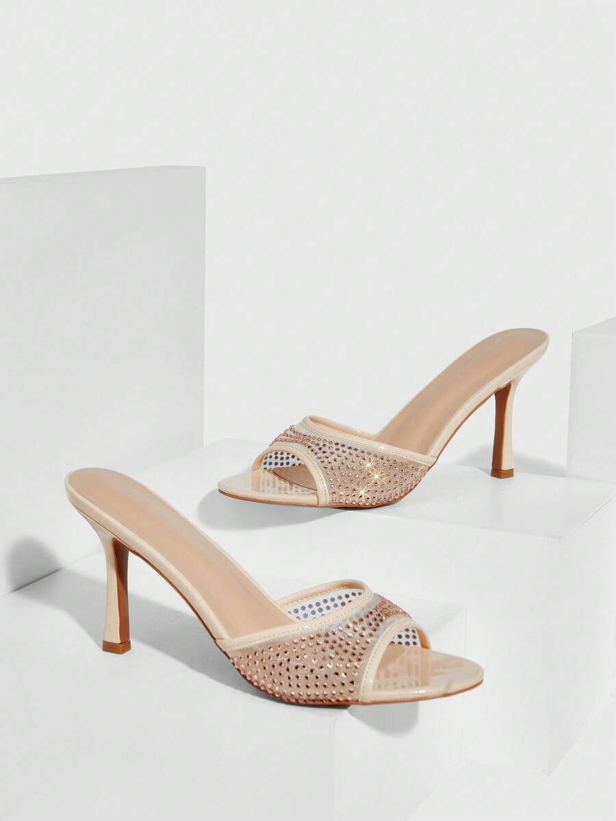 Women's black high heel sandals featuring contrast mesh upper, rhinestone embellishments, and a stiletto heel.