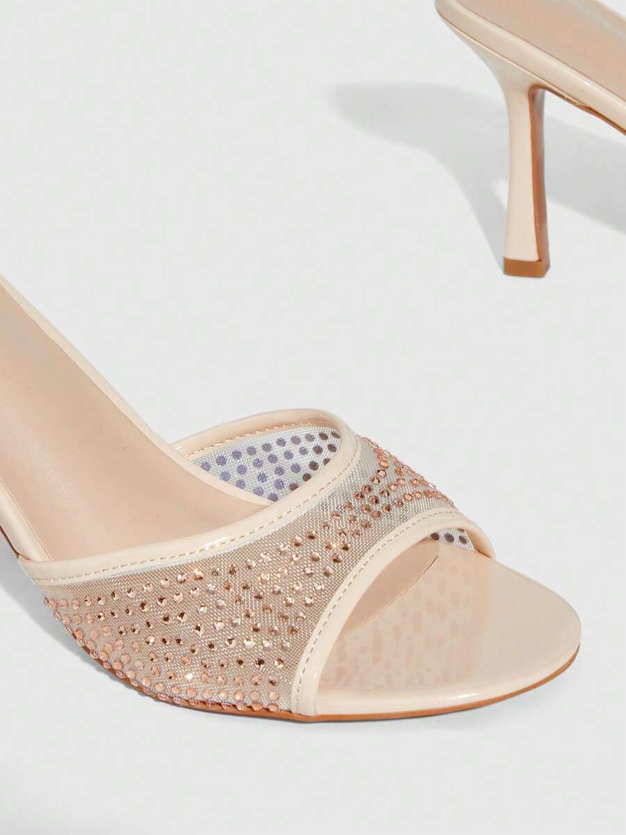 Women's black high heel sandals featuring contrast mesh upper, rhinestone embellishments, and a stiletto heel.