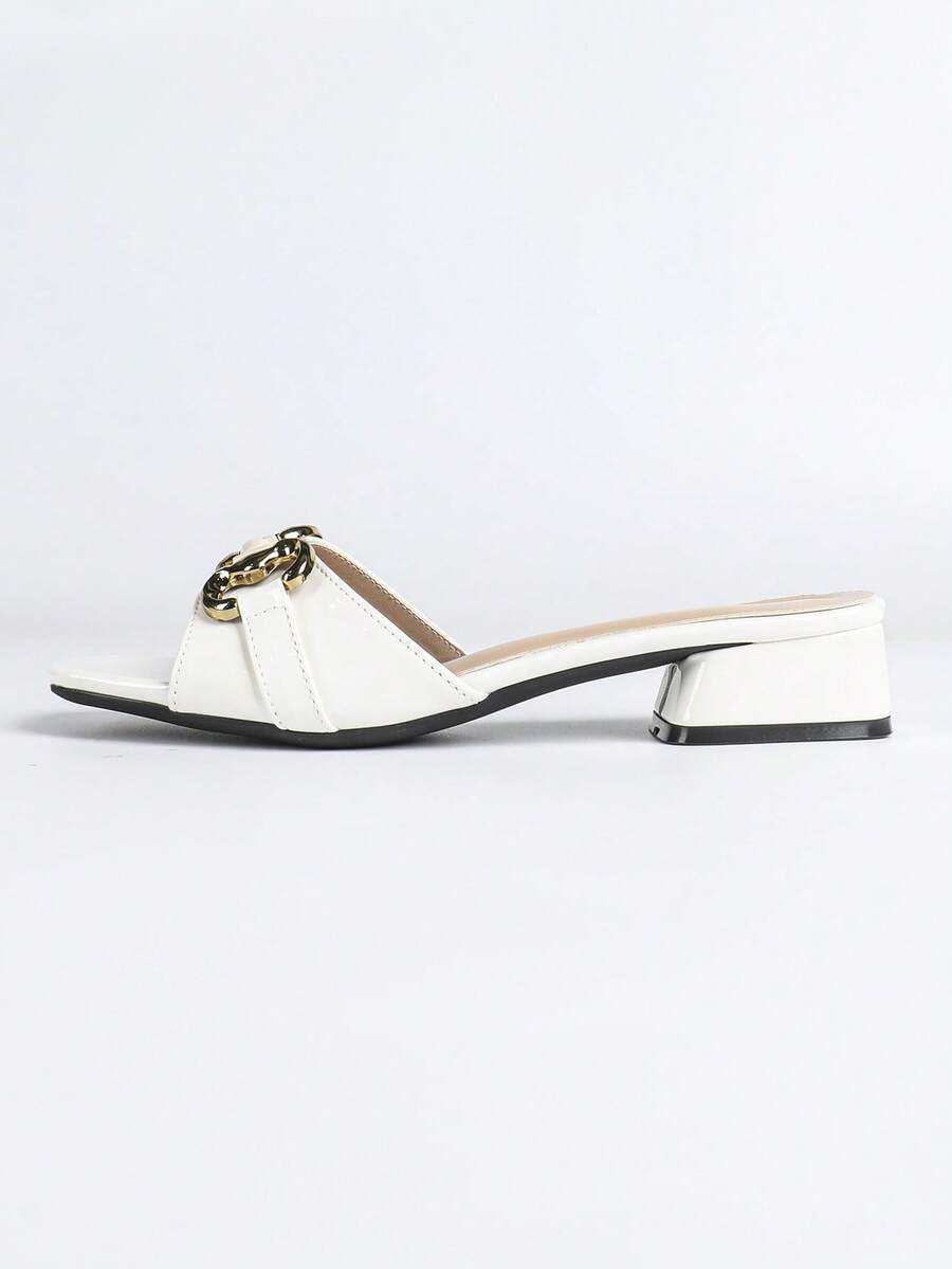 Women's multicolor square toe chunky heel sandals with bohemian textured pattern, canvas upper, and slip-on design.