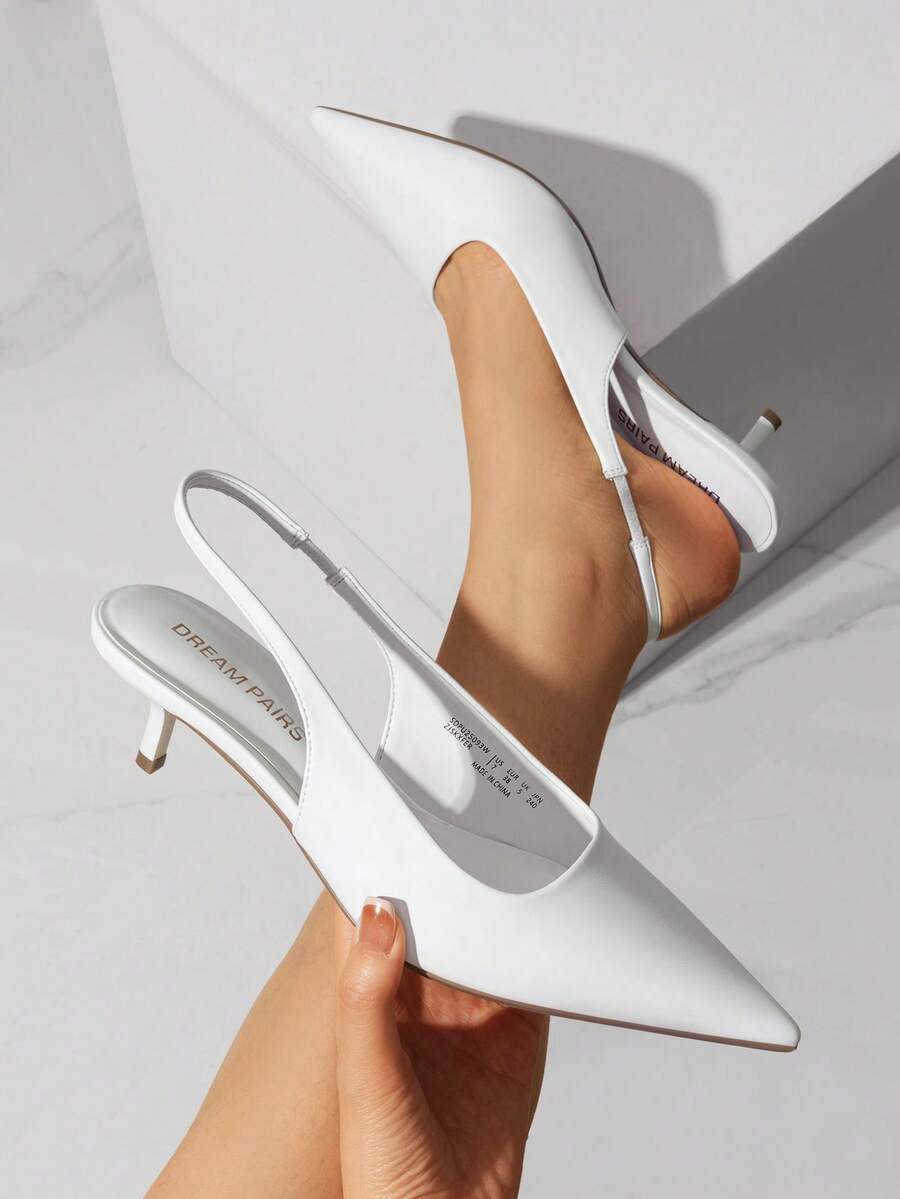 Pointed toe slingback kitten heel pumps in burgundy patent leather with low heel and slip-on strap for women
