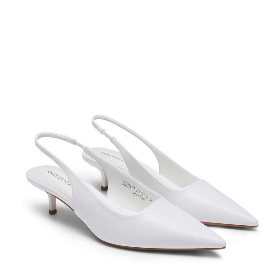 Pointed toe slingback kitten heel pumps in burgundy patent leather with low heel and slip-on strap for women
