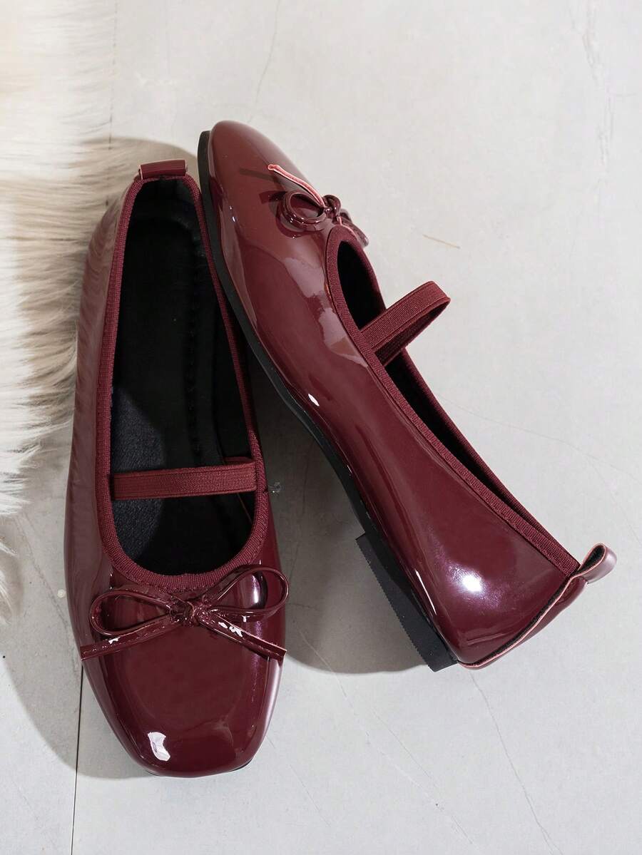 Square toe ballet flat shoes with bow detail and slip-on wide fit design.