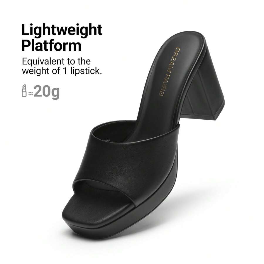 Women's minimalist open toe mule sandals featuring a chunky low heel, wide single strap, and slip-on design.