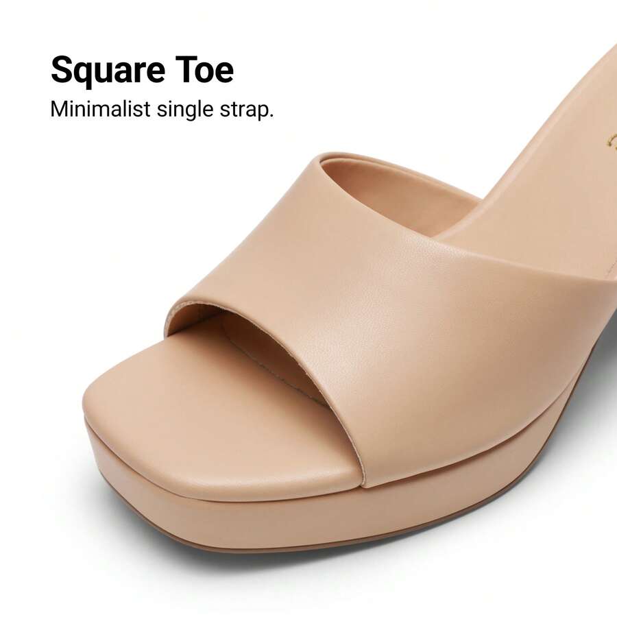 Women's minimalist open toe mule sandals featuring a chunky low heel, wide single strap, and slip-on design.