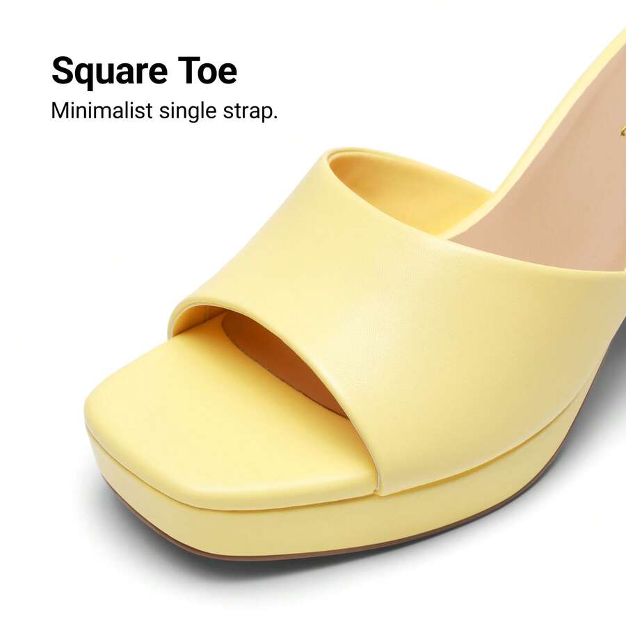 Women's minimalist open toe mule sandals featuring a chunky low heel, wide single strap, and slip-on design.