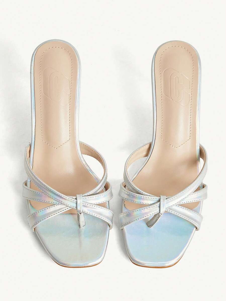 Square toe gold metallic heel sandals for women featuring open toe, crossover slingback strap, and stiletto mid heel for weddings and parties.