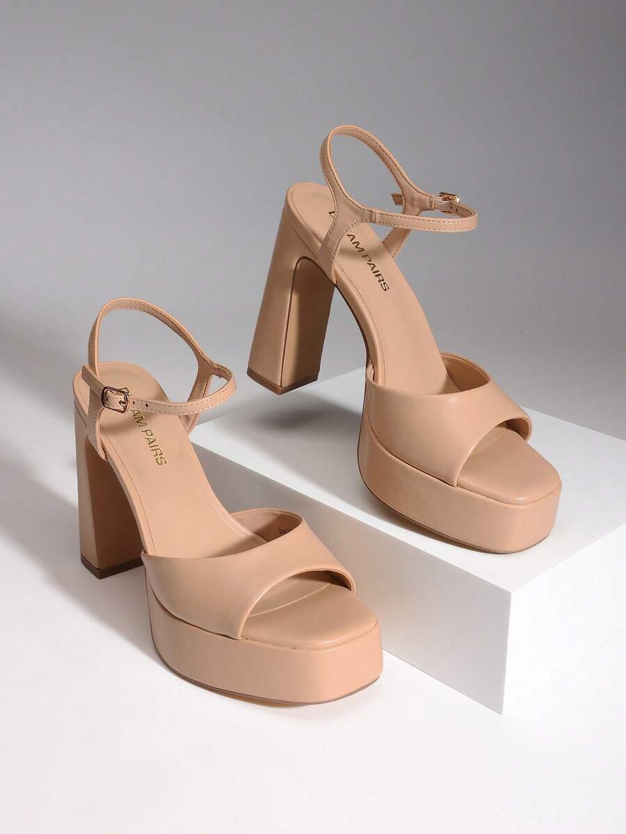 Women's open toe chunky high heel sandals featuring a platform sole, buckle ankle strap, and plain PU leather finish.