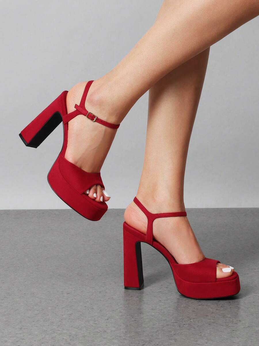 Women's open toe chunky high heel sandals featuring a platform sole, buckle ankle strap, and plain PU leather finish.