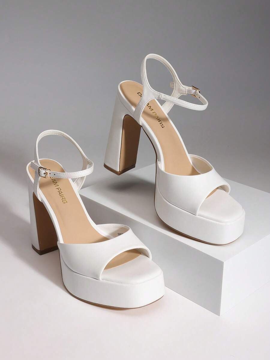 Women's open toe chunky high heel sandals featuring a platform sole, buckle ankle strap, and plain PU leather finish.