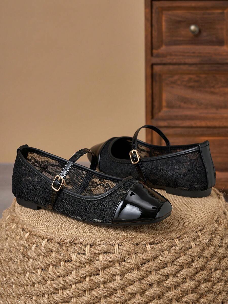 Pair of women's square toe slip-on flat shoes featuring a delicate bow detail and low vamp design.