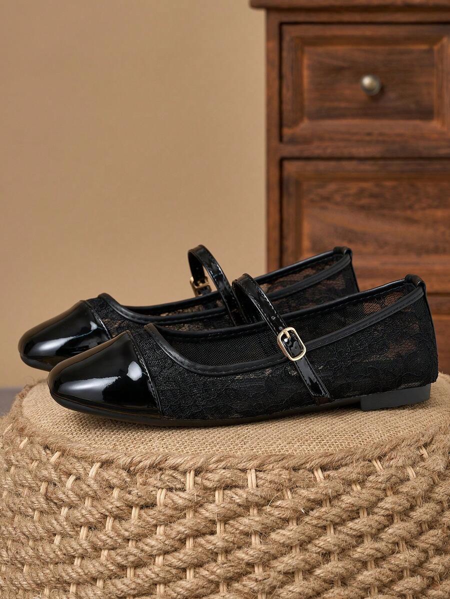 Pair of women's square toe slip-on flat shoes featuring a delicate bow detail and low vamp design.