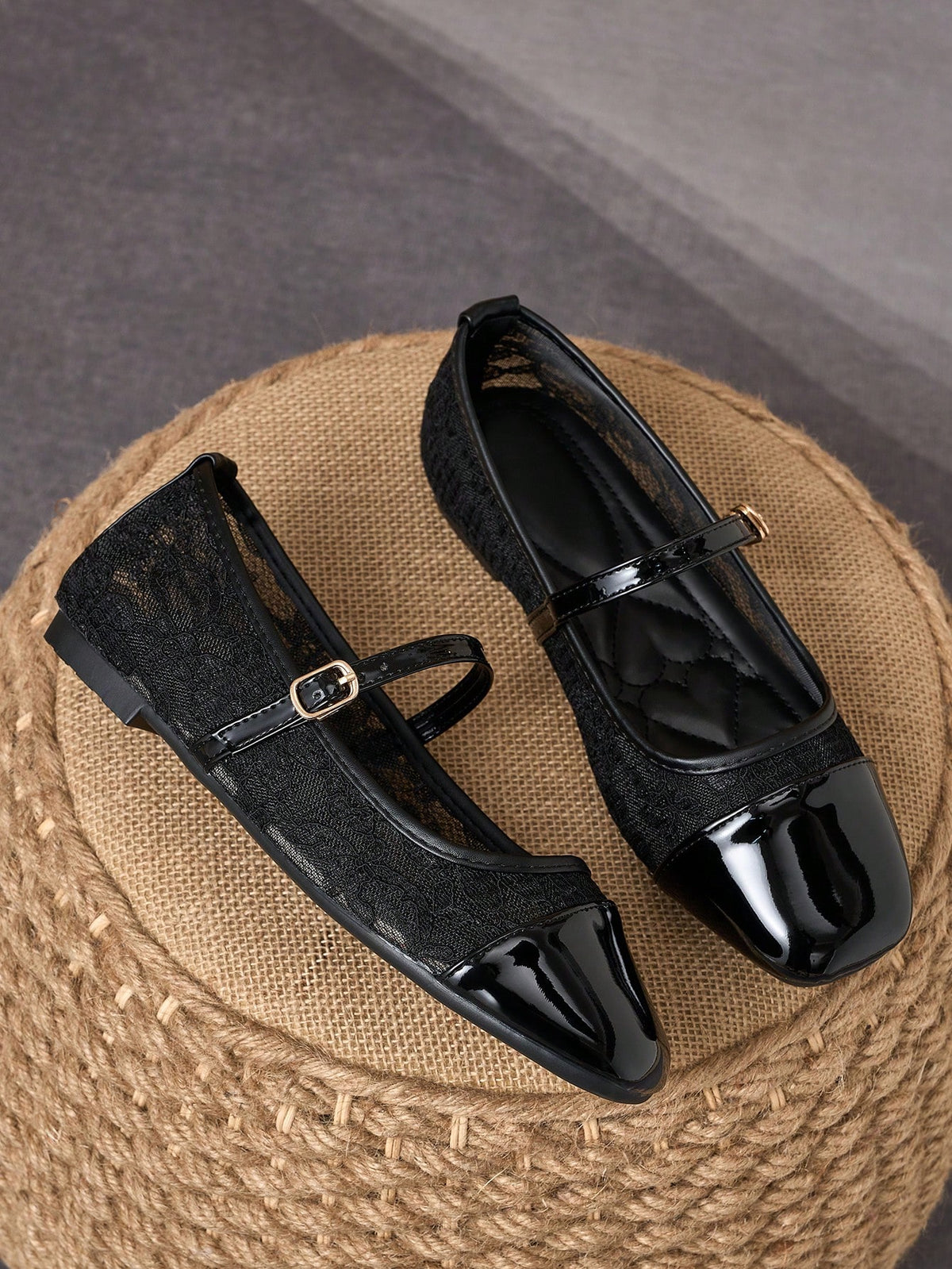 Pair of women's square toe slip-on flat shoes featuring a delicate bow detail and low vamp design.