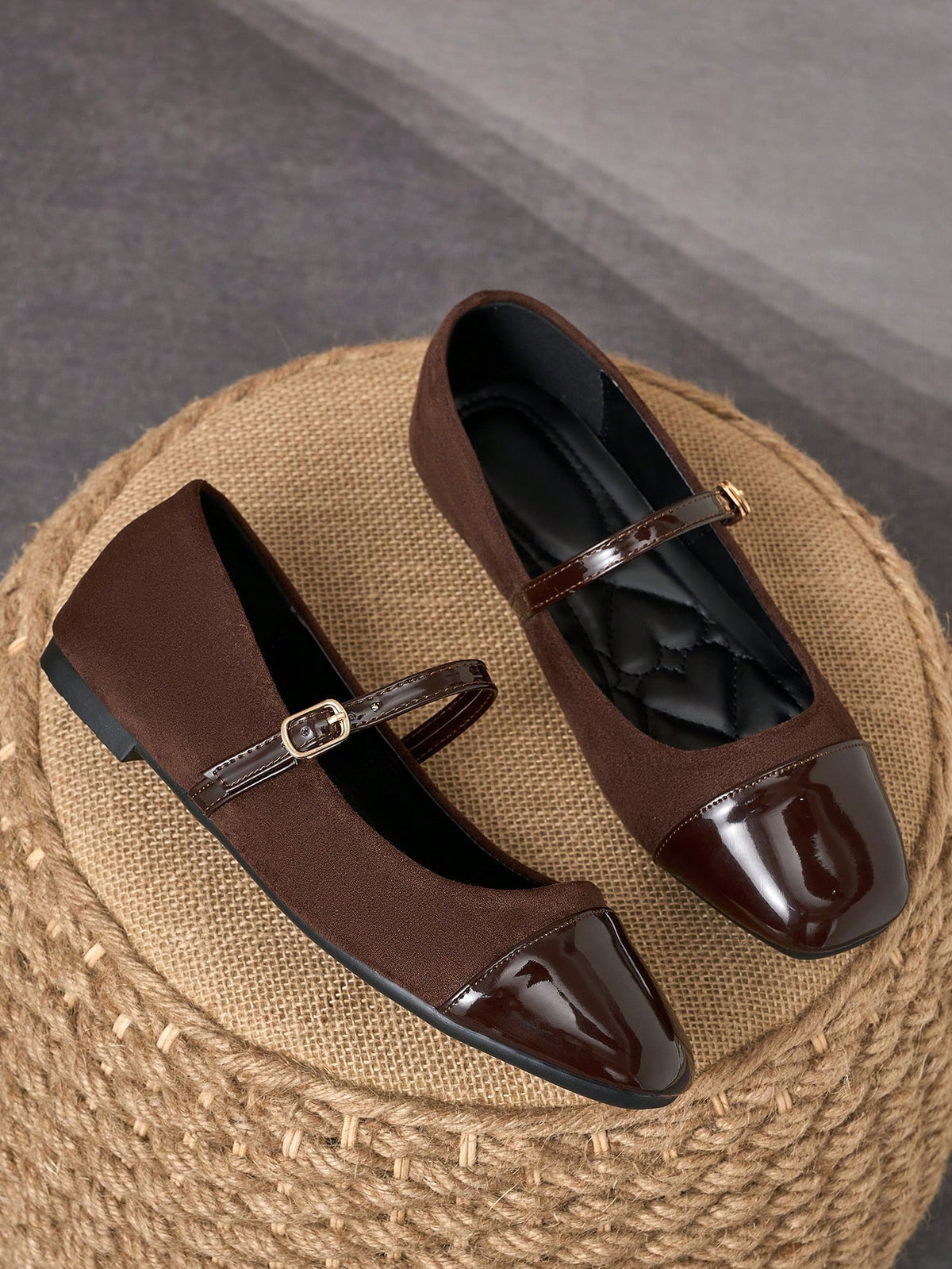 Pair of women's square toe slip-on flat shoes featuring a delicate bow detail and low vamp design.
