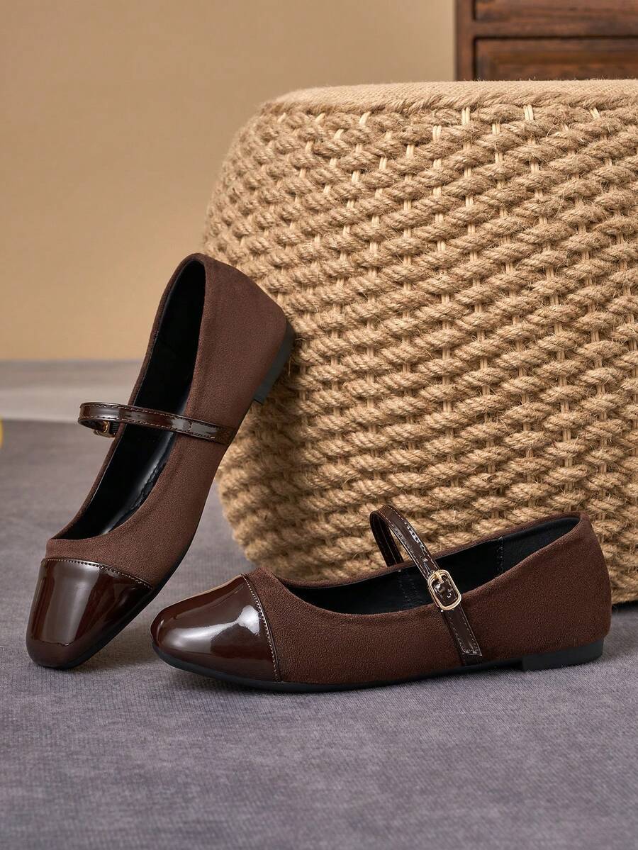 Pair of women's square toe slip-on flat shoes featuring a delicate bow detail and low vamp design.