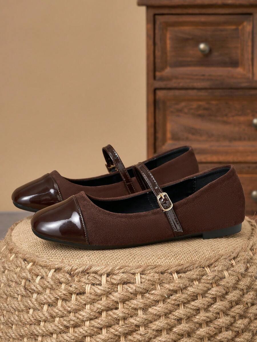 Pair of women's square toe slip-on flat shoes featuring a delicate bow detail and low vamp design.
