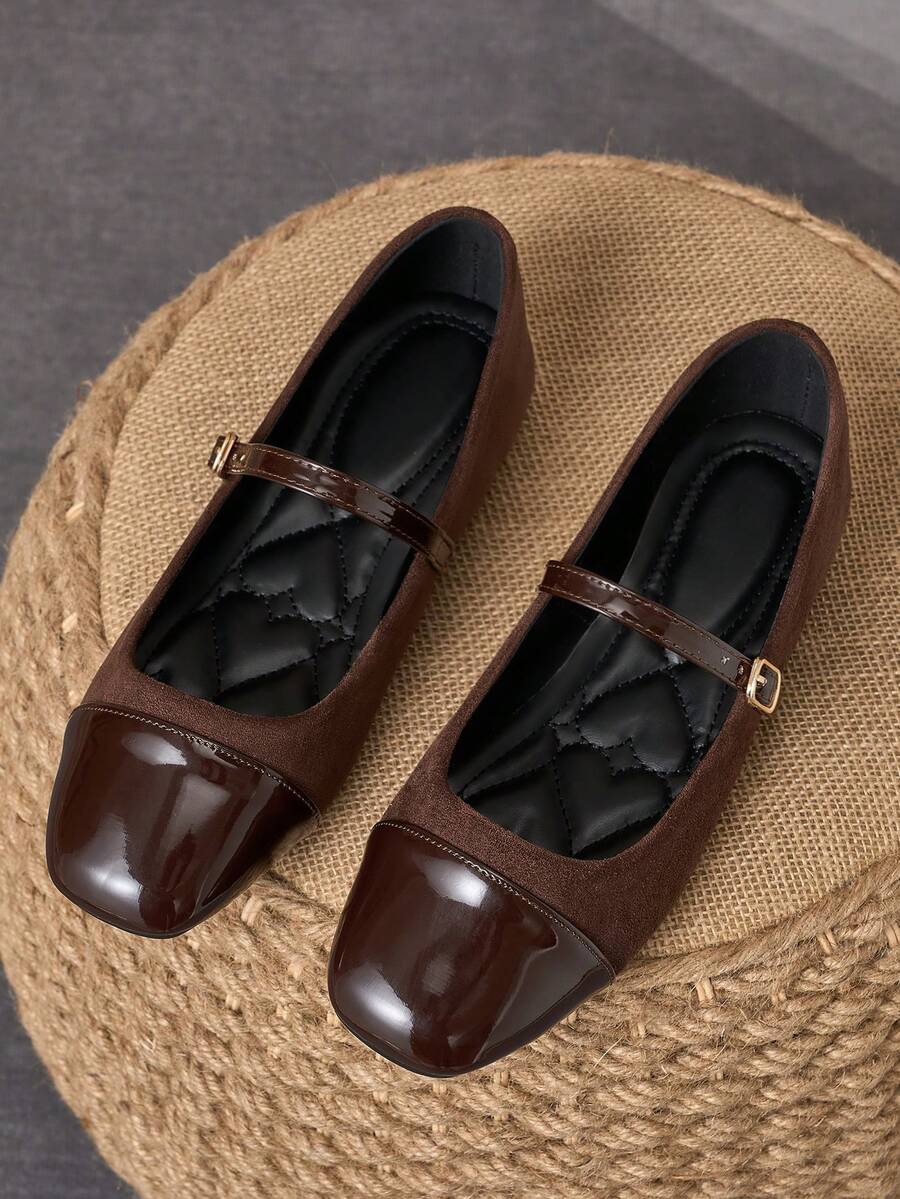 Pair of women's square toe slip-on flat shoes featuring a delicate bow detail and low vamp design.