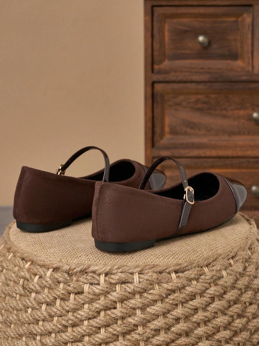 Pair of women's square toe slip-on flat shoes featuring a delicate bow detail and low vamp design.